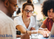 Group of people review how they can improve their credit score