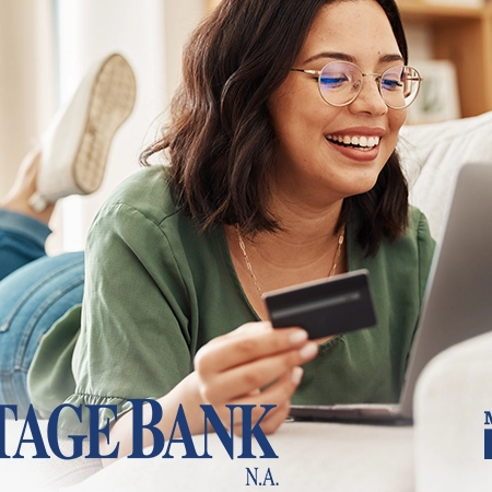 Woman shopping online with credit card